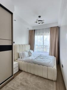 Comfort living one bedroom apartment with fully equipped ,gym, heated swimming pool private parking space, child play area and amazing scenic views