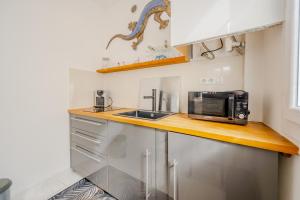 Le nid du Lézard - Studio climatisé proche des plages