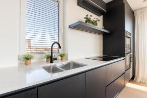 Stylish apartment in De Haan with Pool and garage