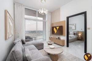 Vogue Vacation Homes, Arjan Skyz by Danube near Miracle Garden, one bedroom Apartment with Balcony and City View, Access toAmenities