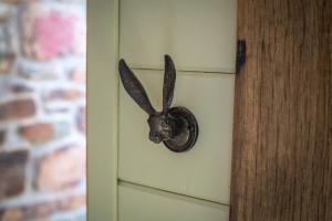 Idyllic countryside cabin with stream and lake