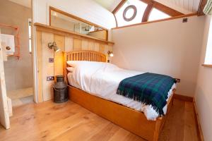 Idyllic countryside cabin with stream and lake