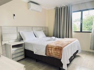 Amplo apartamento, acesso fácil ao Centro e Shopping