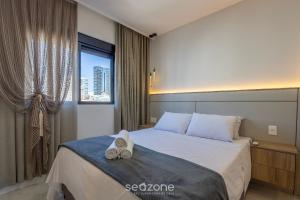 Apto c varanda gourmet a 700m da Praia BON1101