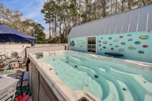 Less Than 1 Mi to Beach Oak Island Retreat with Swim Spa!
