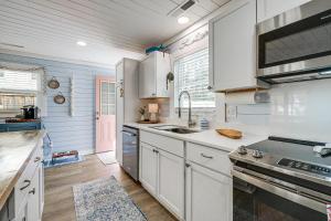 Less Than 1 Mi to Beach Oak Island Retreat with Swim Spa!
