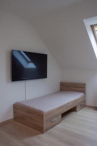 Podkrovní apartmán se společným bazénem