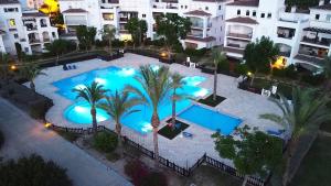 Adosado con espectacular jardín en resort de golf