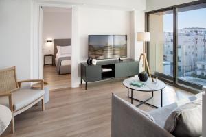 L Residences & Suites