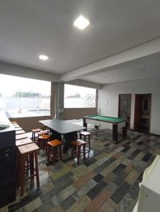 Casa de temporada com piscina e sinuca em Peruíbe