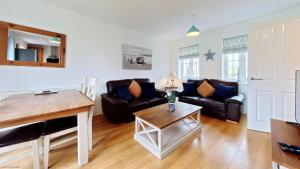 Bayside Cottage - Seaview and Balcony - Part of the The Bay Filey Holiday Village with pool, gym and direct beach access, pub, restaurant, tennis and meadows walks