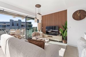 Estepona Retreat 3BR with Ocean Views - Fitness, Pool and Wellness Access