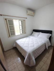 Casa com Churrasqueira, Ar Condicionado a 300m Praia para 10 pessoas