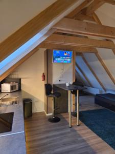 Moderne Dachgeschosswohnung am Wald