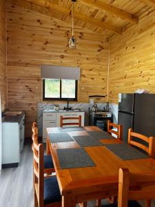 Emmy & Bely, Cabañas Jardín del Río