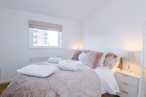 Stylish MCR 1BR Apt Etihad Coop Live Parking