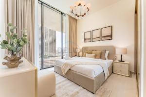Bright 1BR Apartment Stay with Mini Pool, Near Community Parks - Binghatti Royale, Jumeirah Village Circle by Deluxe Holiday Homes