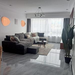 luxury elegant furnished two bedroom apartment with children playing ground,swimming pool relaxing rooftop with amazing city views, ample parking space and proximity to major shopping malls