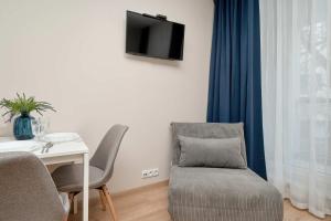 Functional & Cozy Studio close to the City Center with Balcony by Noclegi Renters