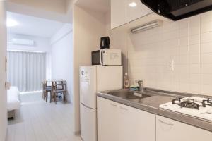 オルフェア難波11番館205