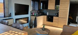 Poellodge, Luxe houseboot met zonnig terras