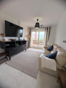 Sea & Mountain View Apartment with Pool & Parking