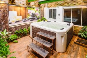 Moonstone meadows 9-BHK Retreat With Private Pool, Garden, Gazebo, & Jacuzzi