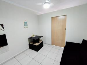 Kitnet pé na areia - Praia Grande Ocian