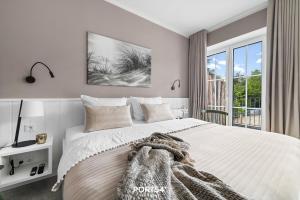 Ferienwohnung TheViewB16 Meeresleuchten Dagebüll