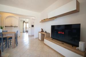 Porto & Spiaggia, Ampio appartamento a La Caletta