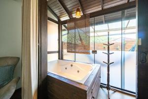 Ganesha Garden na Barra da Lagoa by Achei Floripa