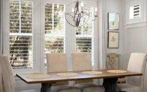 Two Rocking Chairs on a Porch by Oversee 30A