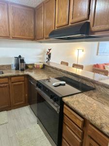 Luxury condo, side ocean view walk to town