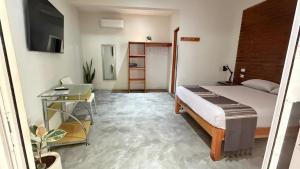 Casa Sixta a 7min del aeropuerto internacional PMX y 2 cuadras terminal autob ADO