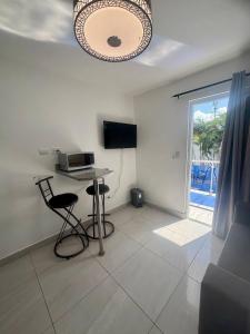 Condo neuf avec balcon prs de tout Sosua 206