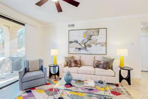 Bright Dog Friendly condo with inviting patio, washer dryer on a Golf Course