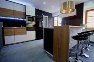 Appartements Le 21 : photos des chambres