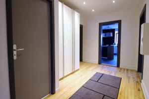 Appartements Le 21 : photos des chambres