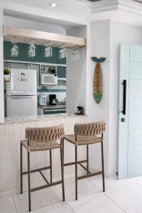 Casa confortável com varanda gourmet e 3 quartos com ar