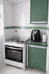 Casa confortável com varanda gourmet e 3 quartos com ar