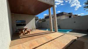 Casa com piscina na terra das Cataratas