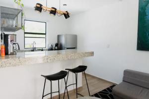 Modern duplex steps from the Malecon & Olas Altas