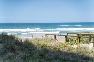 Luscious Sunsets 2BR, Beachfront & Luxe Facilities