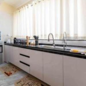 Classy apartment with swimming pool ,fully equipped gym ,child play area and close proximity to shopping malls and great breathtaking views