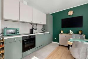 Przytulny Apartament z Balkonem i Biurem w Gdańsku by Noclegi Renters