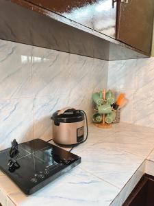 Cozy 2BR Near Dahican Beach - Fast WiFi & Netflix