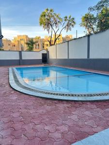Nyali 2 BR with AC, swimming Pool,Balcony & 3 minutes beach walk