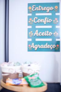 1 Suíte Moderna Meia Quadra da Praia Wifi AC