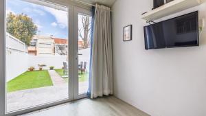 Lisbon City Apartment with Patio by LovelyStay