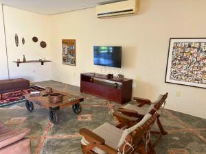 Casa ampla com jardim e 3 suítes em Novo Airão